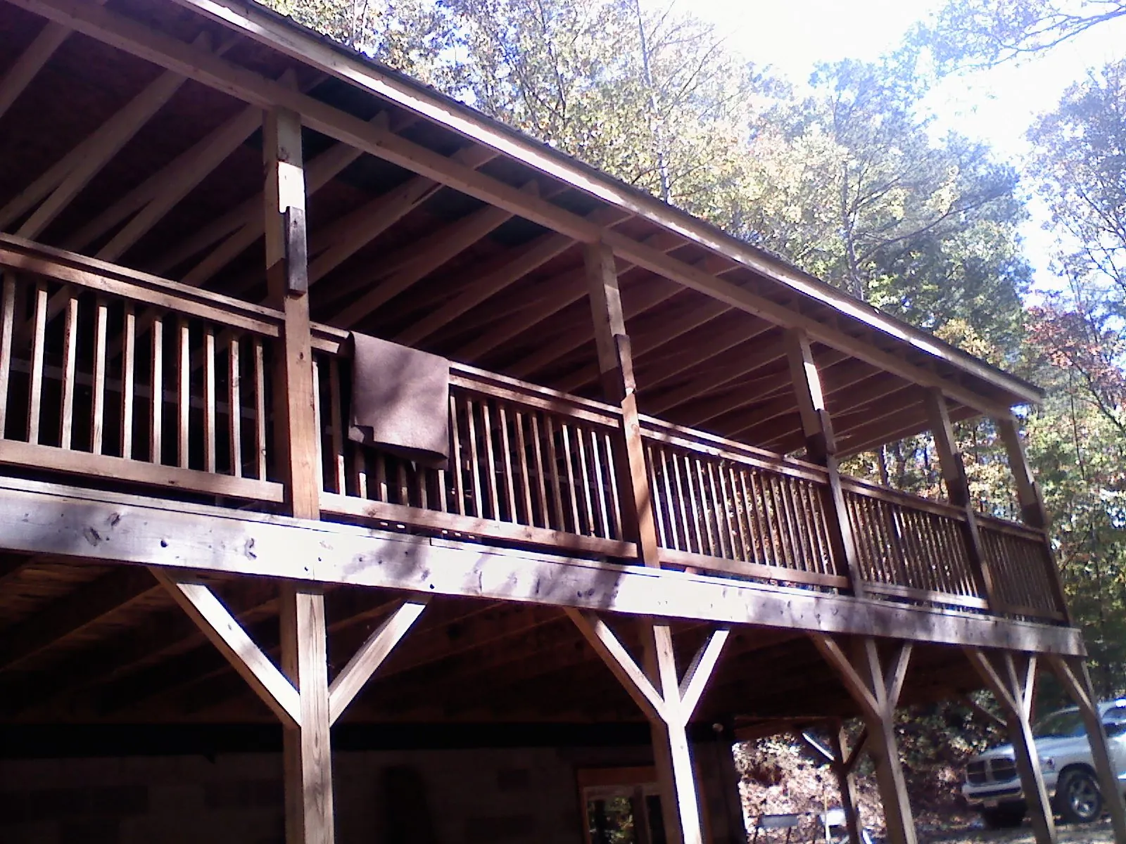 Timber framing under a new elevated porch and deck — Roof Leak Repair in Left Hand by Roofing Brothers